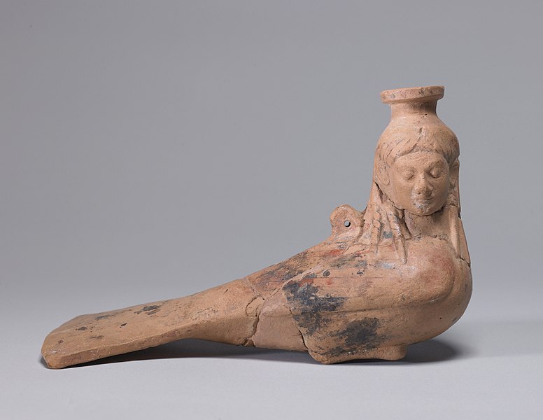 Archaic perfume vase in the shape of a siren